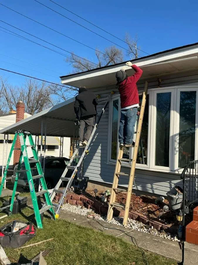 Restoration crew performing exterior repair in Merced